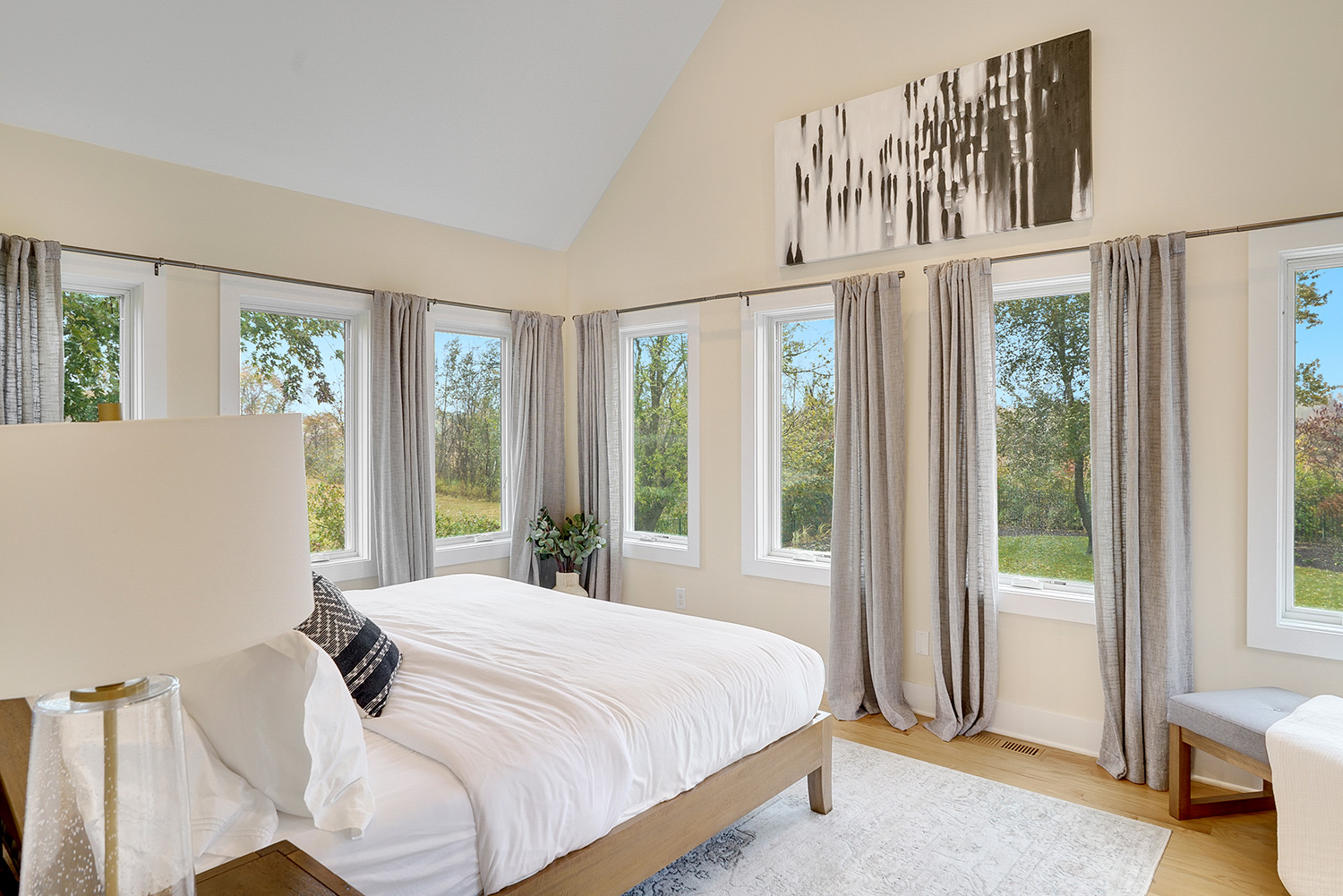 bedroom with multiple windows