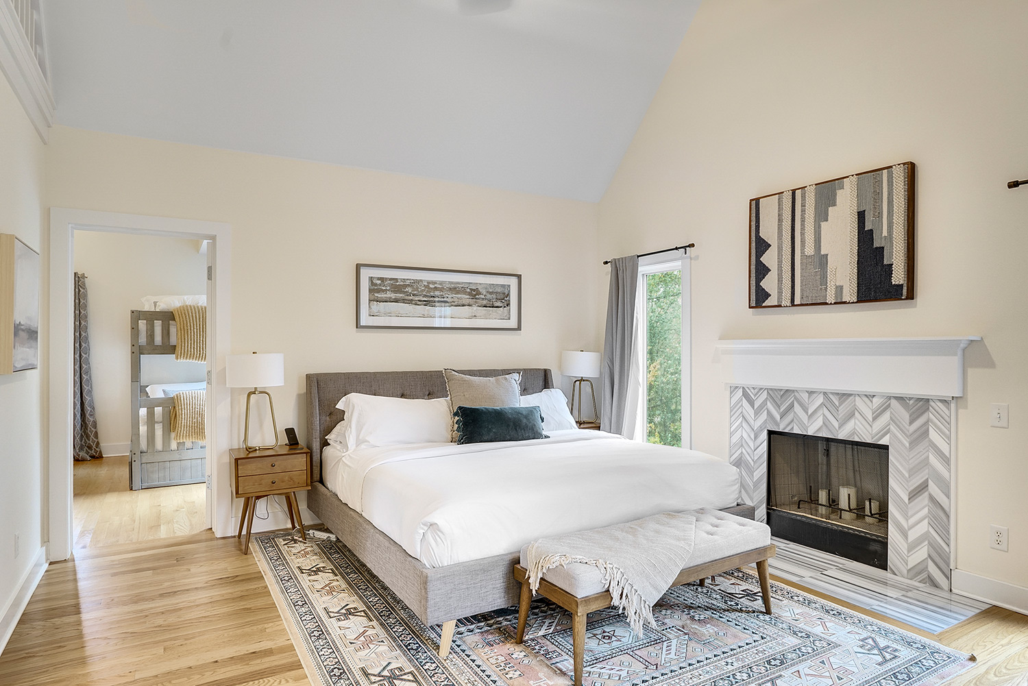 cozy bright bedroom with fireplace