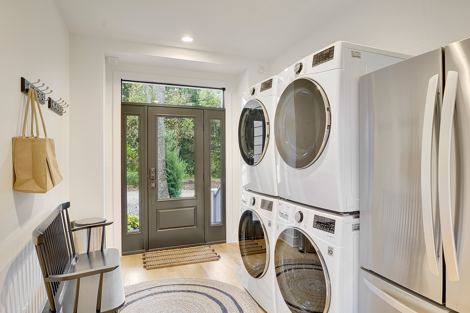 mudroom with washer and dryers